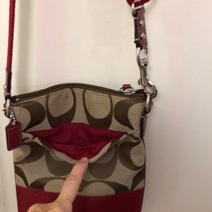 Coach purse red with Coach  pattern, never carried